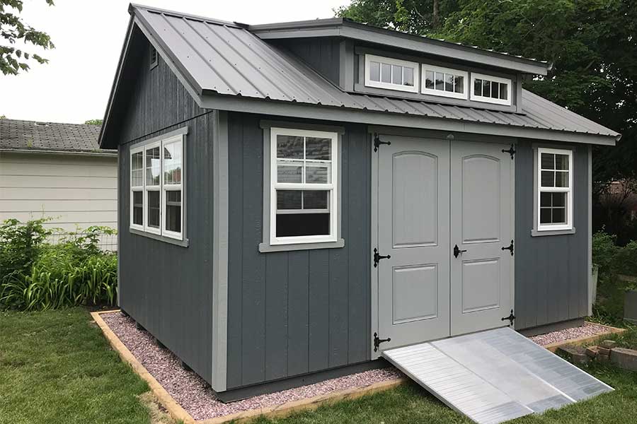 Shed Ramps Attached to Gray Shed